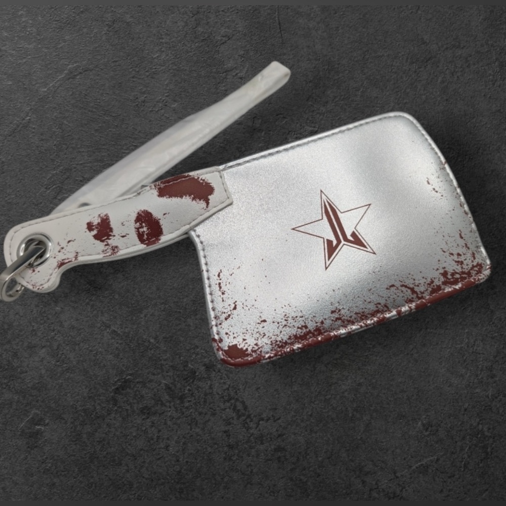 Jeffree Star Meat Cleaver Silver and Red Star wristlet NWOT